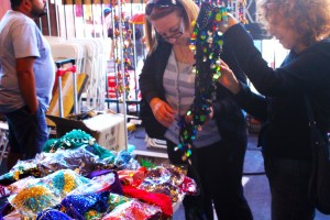 Judy Delarosa on the left sifts through indian clothing with her friend Jan Singer. thy said they attend the fest because of the shopping and the music. 