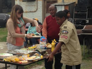 Lacy Bartlett and Jacob Greer volunteer Sunday to help Lola serve some of the 350 children and adults she feeds throughout the week. Lacy's husband also volunteers saying that the experience has taught him that any normal hardworking person can fall on hard times and become homeless.